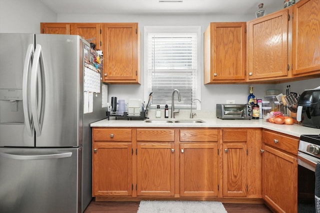 kitchen featuring stainless steel appliances and sink