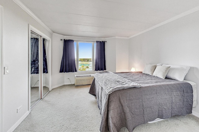 carpeted bedroom with ornamental molding and a wall mounted AC