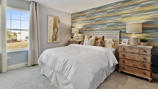 bedroom with light colored carpet