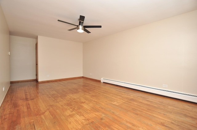 unfurnished room with ceiling fan, light hardwood / wood-style flooring, and a baseboard heating unit