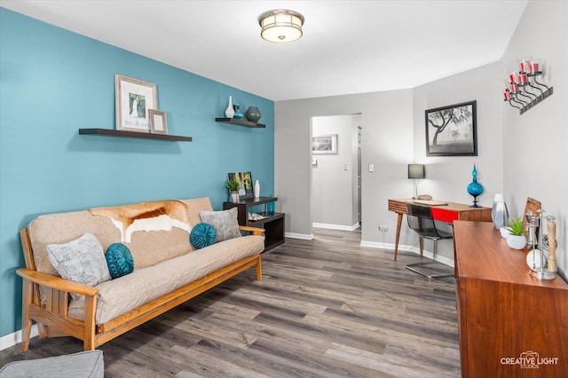 living room with dark hardwood / wood-style flooring