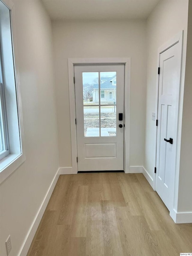 211 W Prairie St, Camp Point, IL 62320 - entryway with baseboards and light wood finished floors