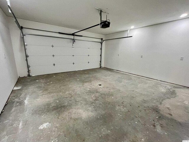 211 W Prairie St, Camp Point, IL 62320 - garage with a garage door opener