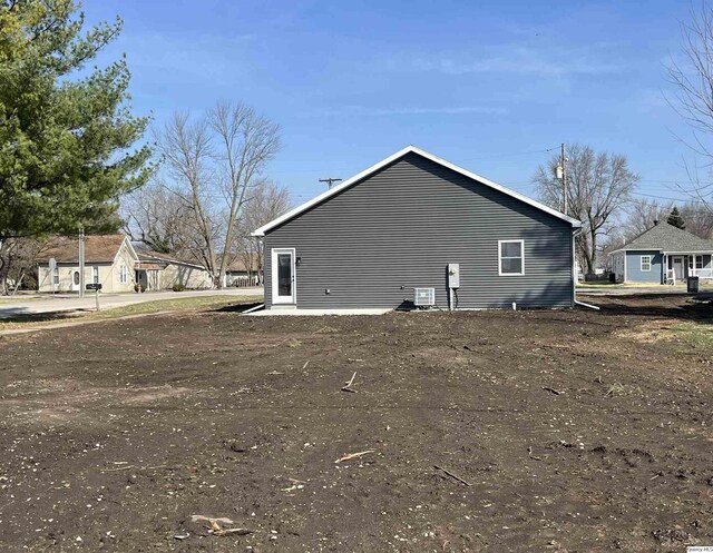211 W Prairie St, Camp Point, IL 62320 - view of home's exterior with central AC