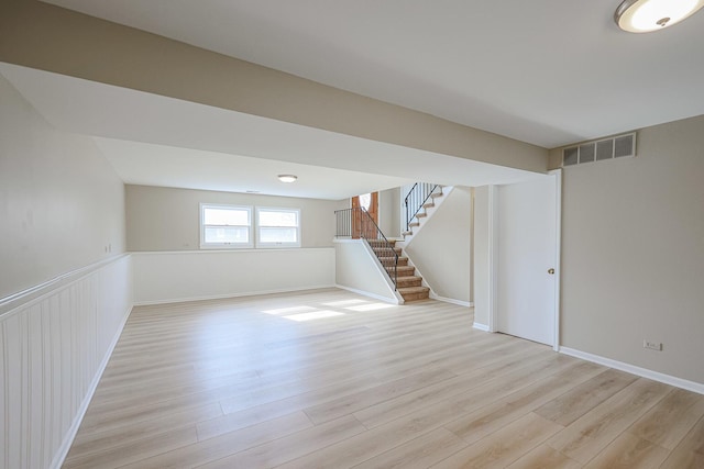 basement featuring light hardwood / wood-style floors