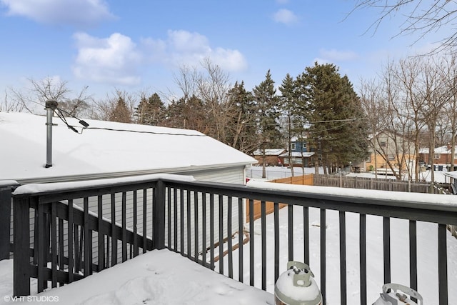 view of snow covered deck