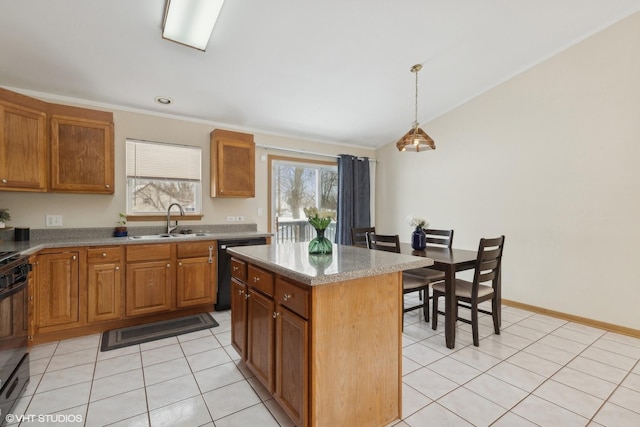 kitchen featuring sink, light tile patterned floors, dishwasher, a kitchen island, and pendant lighting