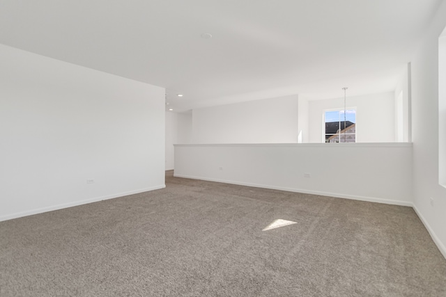 empty room featuring carpet floors