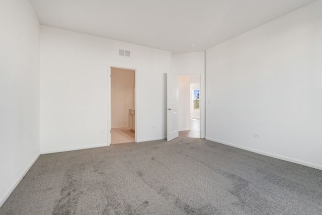 empty room with carpet floors