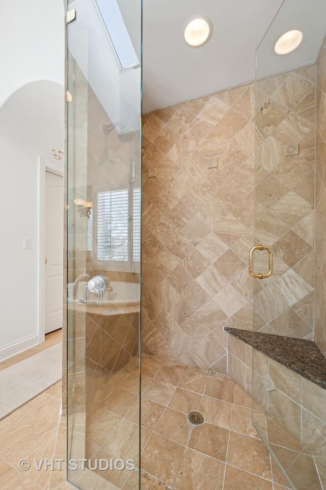 860 Gage Ln, Lake Forest, IL 60045 - bathroom with a skylight, a shower stall, and tile patterned floors