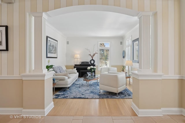 860 Gage Ln, Lake Forest, IL 60045 - living area featuring arched walkways, light tile patterned floors, and decorative columns