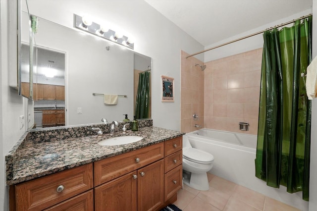 full bath featuring toilet, tile patterned flooring, shower / bath combination with curtain, and vanity