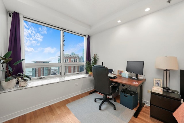 office area featuring light wood-type flooring, baseboards, and recessed lighting