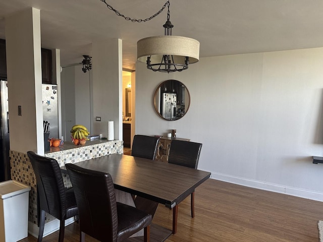 dining room featuring dark wood-type flooring