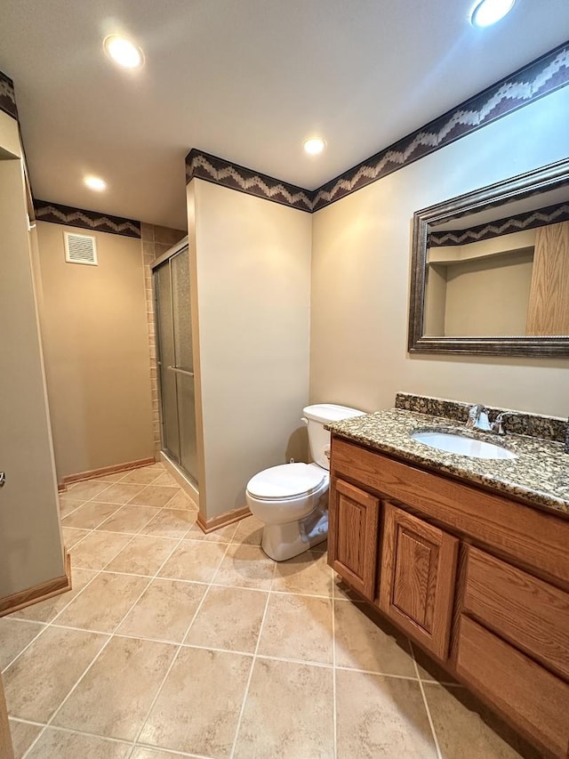 bathroom featuring a stall shower, visible vents, toilet, vanity, and recessed lighting