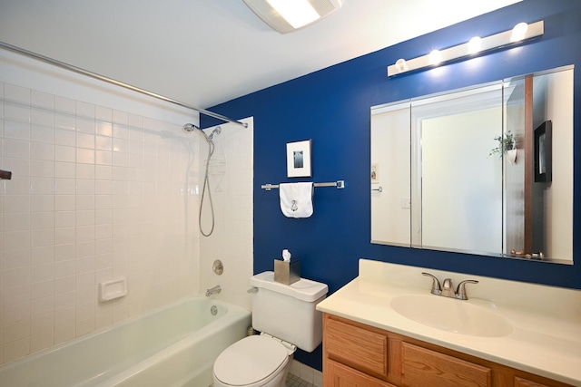 bathroom with vanity, toilet, and shower / bathtub combination