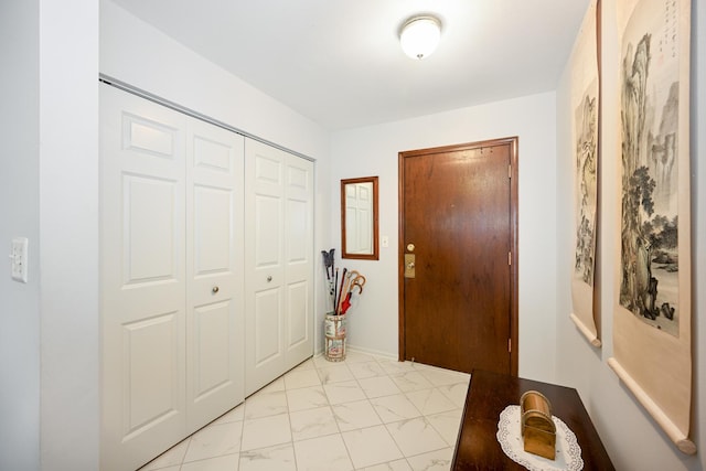 foyer with marble finish floor