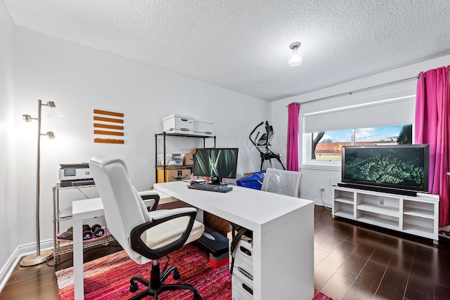 office featuring dark hardwood / wood-style floors and a textured ceiling