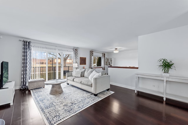 living room with dark wood-type flooring