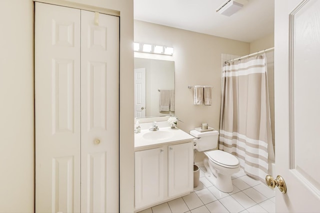 full bath featuring a shower with curtain, toilet, a closet, tile patterned flooring, and vanity