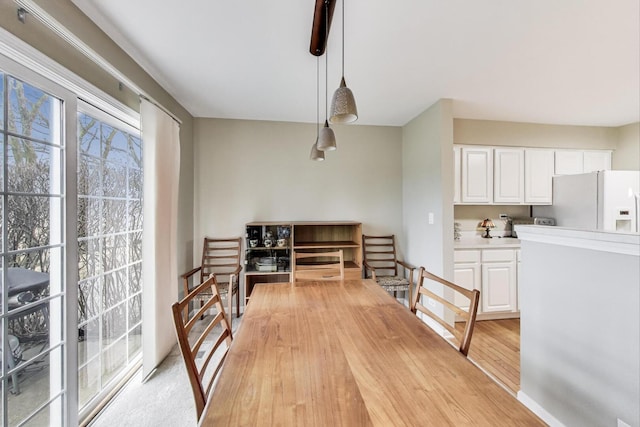 dining room with light wood finished floors