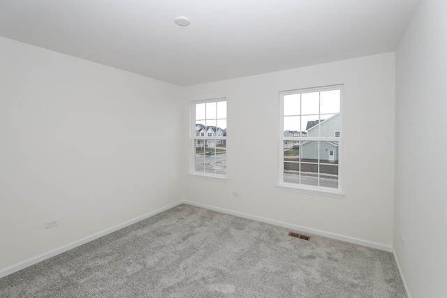 view of carpeted spare room