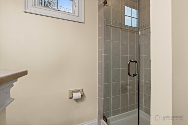 bathroom with a tile shower