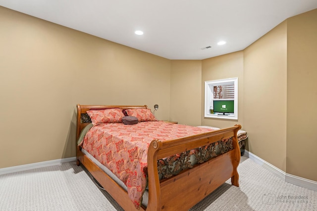 carpeted bedroom with baseboards, visible vents, and recessed lighting