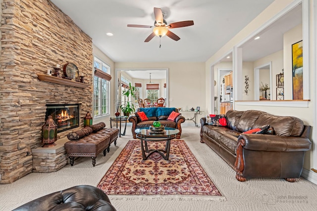 living area featuring carpet, a fireplace, recessed lighting, and ceiling fan