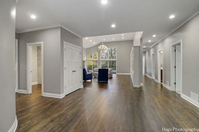 interior space with an inviting chandelier, crown molding, dark wood-type flooring, and lofted ceiling