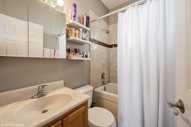 bathroom featuring vanity, toilet, and shower / tub combo with curtain