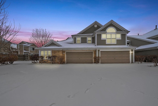 view of front of property featuring a garage