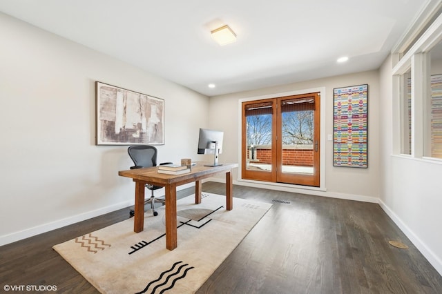 office space featuring visible vents, baseboards, wood finished floors, and recessed lighting