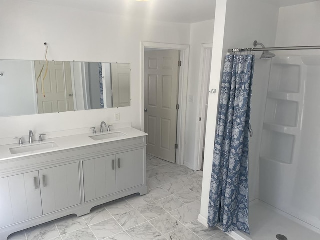 bathroom with vanity and curtained shower