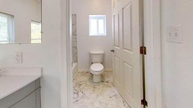 full bathroom with vanity, toilet, and washtub / shower combination