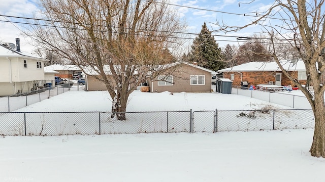 view of yard covered in snow