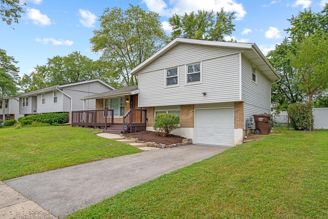 split level home with a garage, a front lawn, a porch, and brick siding