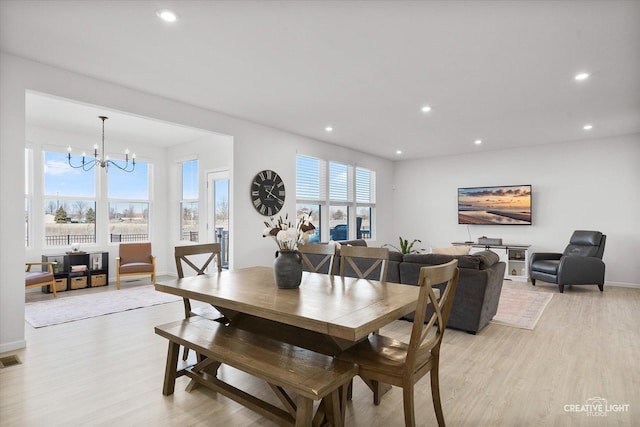 dining area with a notable chandelier, recessed lighting, visible vents, baseboards, and light wood finished floors