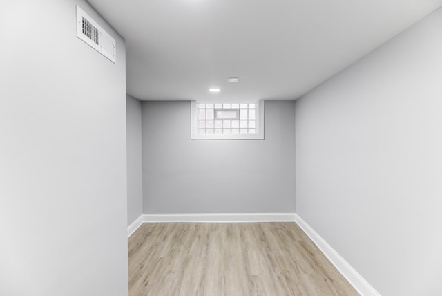 basement with light wood-type flooring