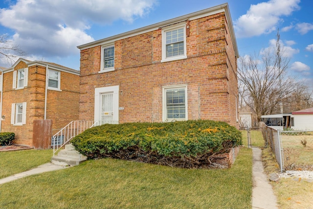 view of front of property with a front lawn