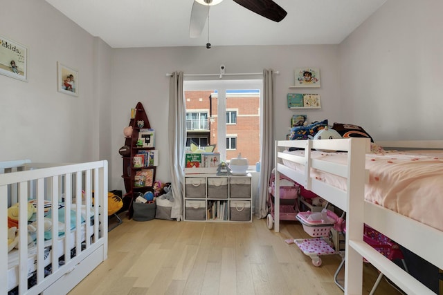 bedroom featuring ceiling fan and wood finished floors