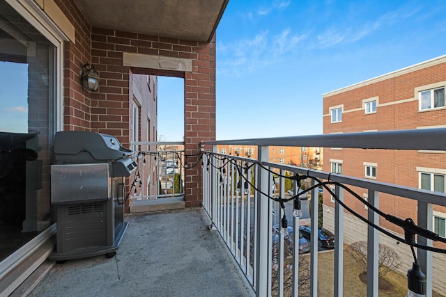 balcony featuring area for grilling