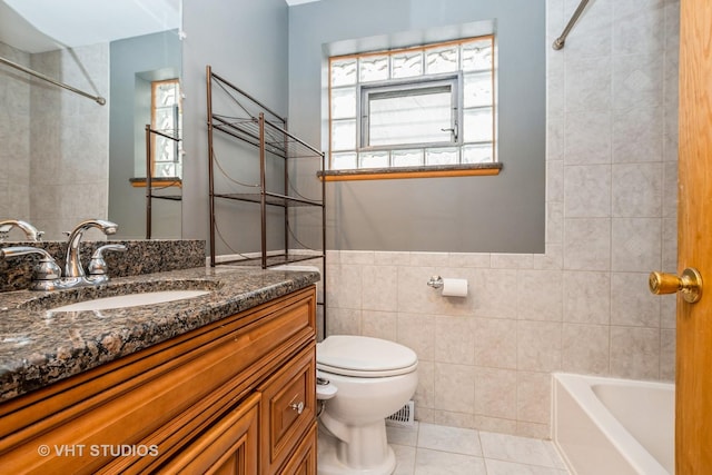 full bathroom featuring shower / tub combination, tile walls, tile patterned flooring, vanity, and toilet