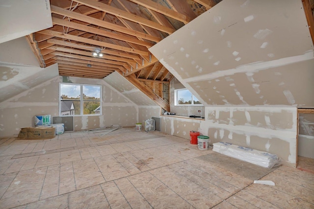 unfinished attic with plenty of natural light