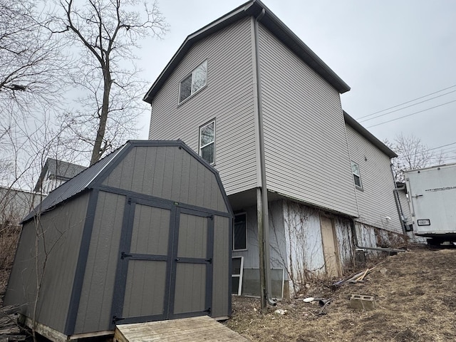 exterior space with a storage shed