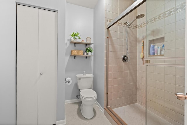 bathroom with walk in shower, toilet, and tile patterned flooring