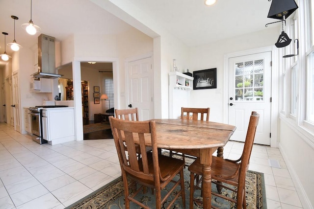 view of tiled dining space