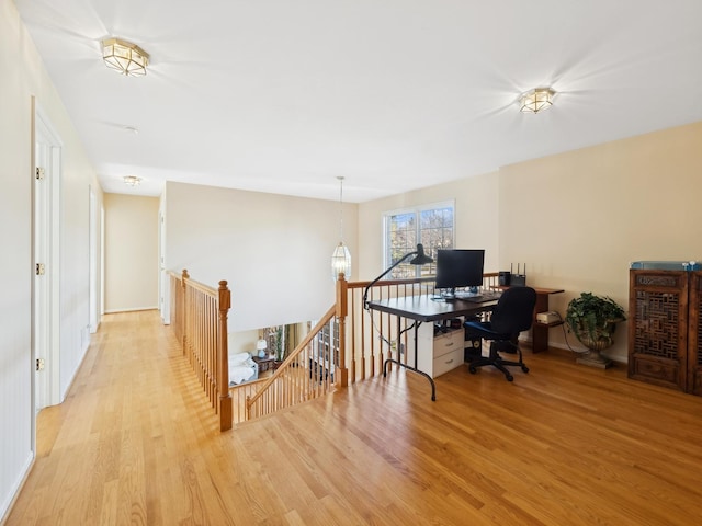 office space with light wood-type flooring