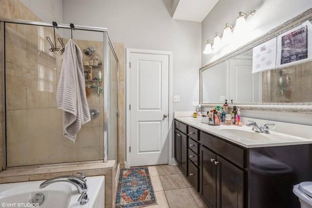 bathroom with vanity, tile patterned flooring, and separate shower and tub