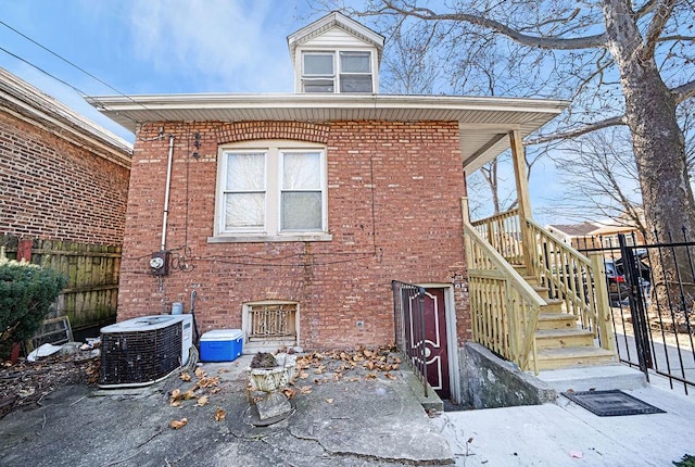 view of property exterior with central AC unit